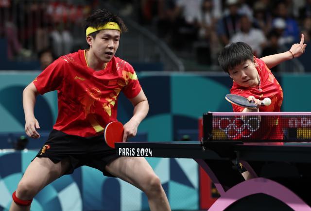 1734873511542043987.jpg 巴黎奥运会丨乒乓球——王楚钦_孙颖莎混双夺冠XxjpseC010132_20240730_MVPFN0A001.jpg